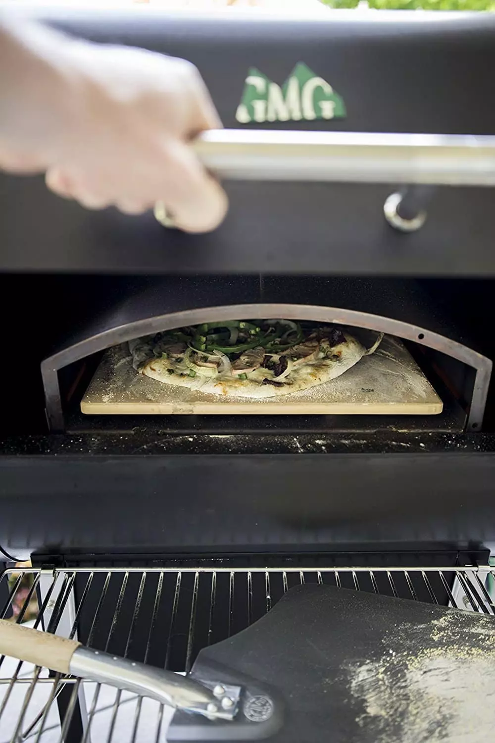 Convert an outdoor grill into a pizza oven