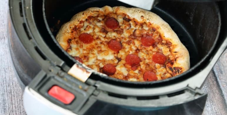 How To Reheat A Frozen Pizza- Best Way to get Crispy Pizza