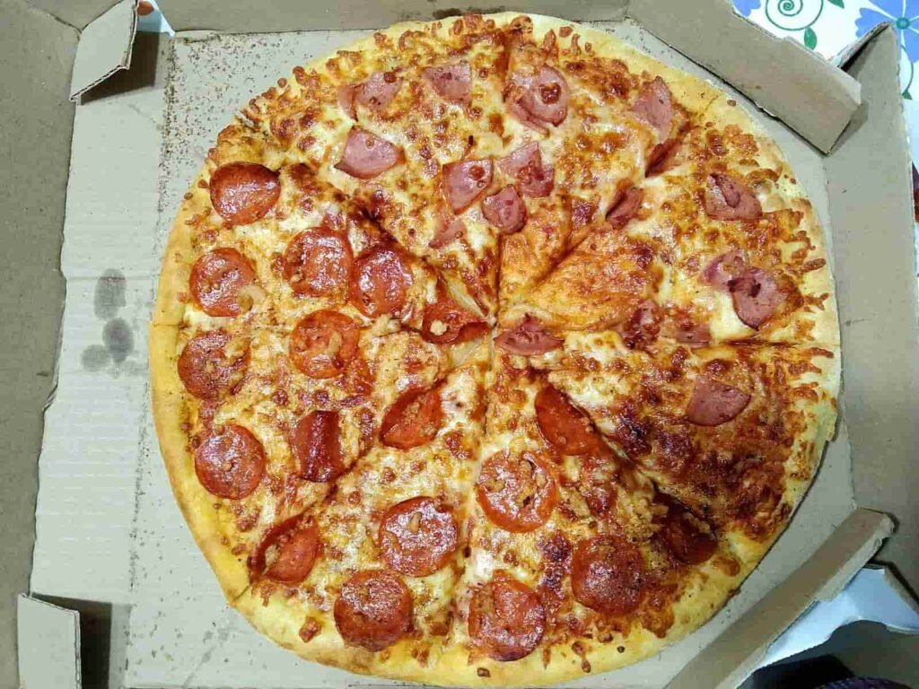 dominos pan pizza vs hand tossed