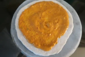 BUffalo sauce on pizza dough