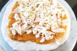 Buffalo sauce, chicken and cheese for pinwheels